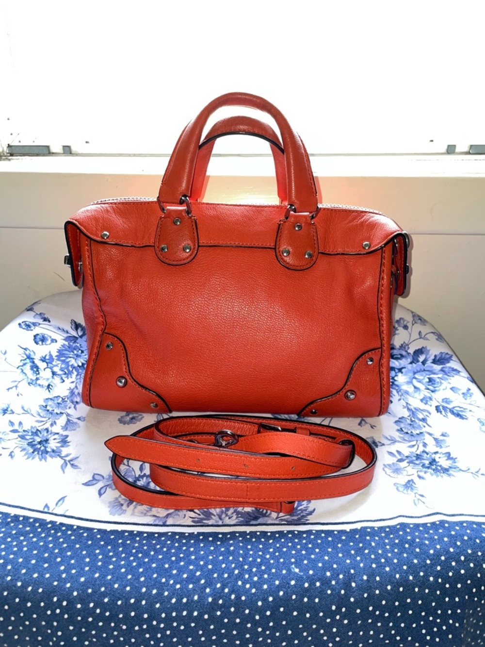 COACH RHYDER 24 IN VERMILLION LEATHER-PERFECT COLOR FOR SPRING/SUMMER. - Picture 2 of 16